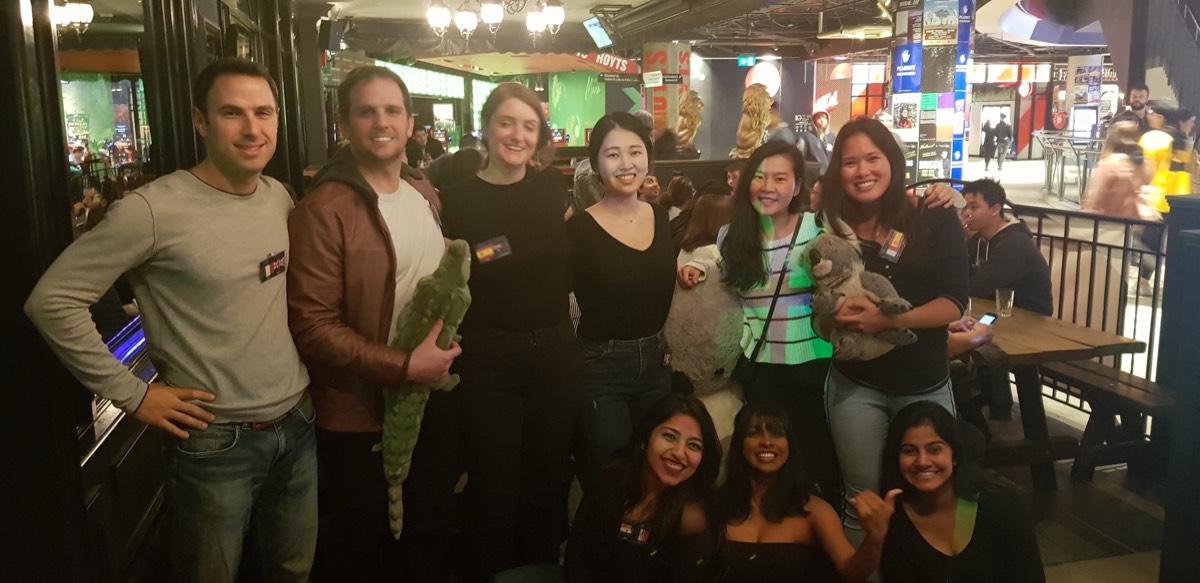 A group of our volunteers smiling together at a Language Exchange night